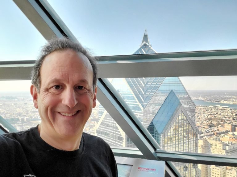 Mike in tall building